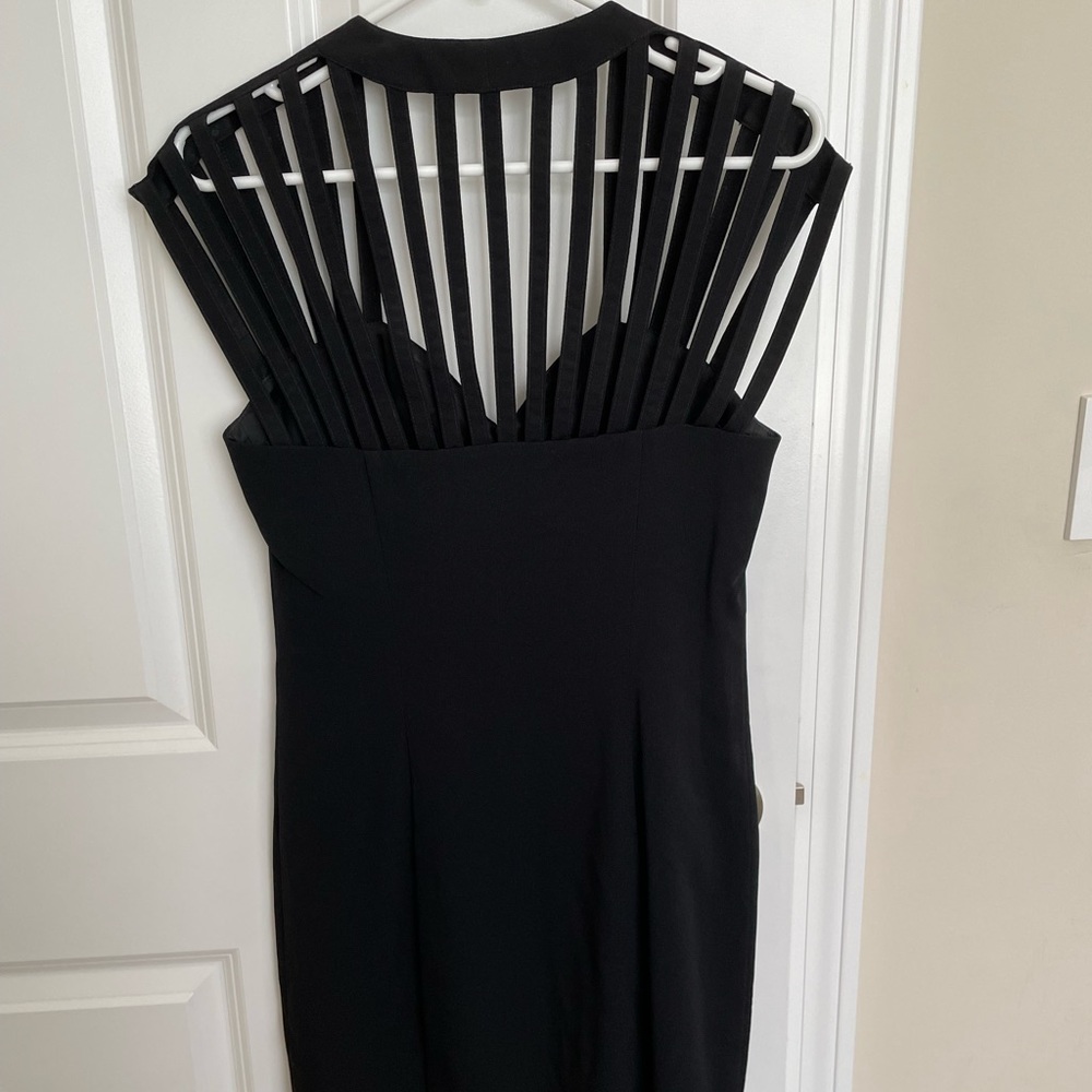 Designer black knee length cocktail dress
